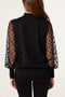 Polka Dot Mesh Sleeve High Neck Jumper