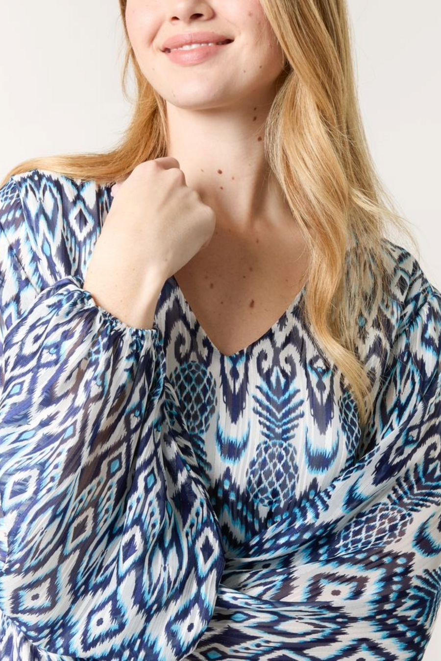 Aztec Print V Neck Puffball Blouse